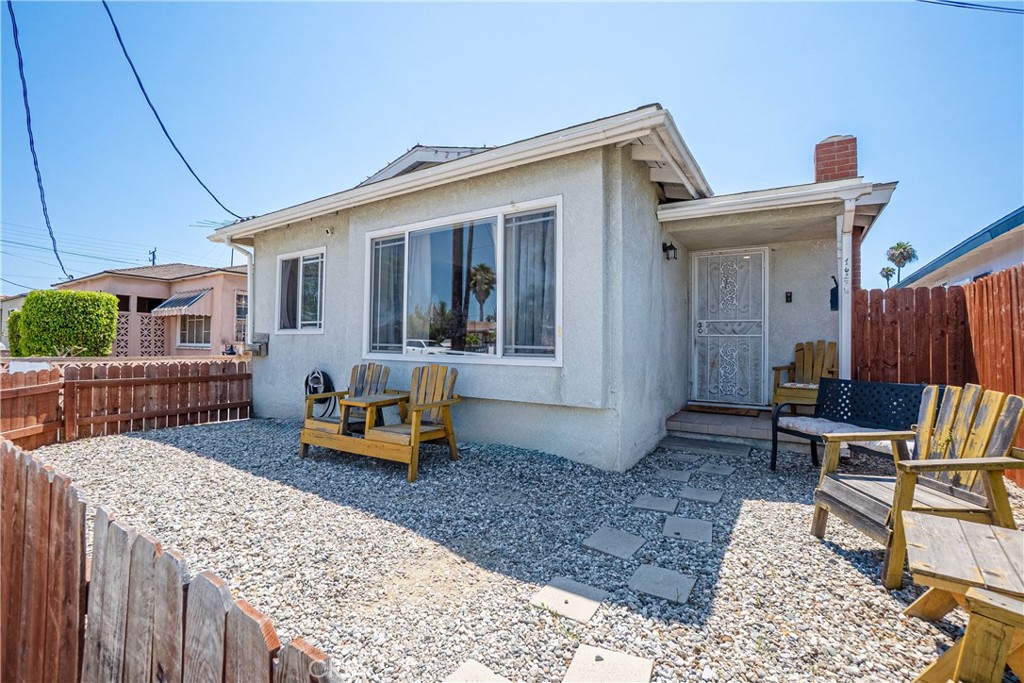 Unlock the potential of this outstanding duplex, ideally situated near schools, parks, dining, grocery stores, and a wealth of local amenities. This income-generating property features two well-maintained residences: a spacious 3-bedroom, 2-bathroom single-family home at the front, and a charming 1-bedroom, 1-bathroom unit at the rear—complete with its own private backyard. Whether you're looking to live in one unit and rent the other, or fully lease both for maximum return, this flexible property offers immediate earning potential. Adding even more value is a detached 2-car garage, offering an excellent opportunity for a future ADU (Accessory Dwelling Unit) conversion—perfect for increasing both rental income and property value. The extended driveway accommodates up to four vehicles, and with the home located just three houses from the corner, ample street parking is also readily available.Don’t miss your chance to own this centrally located, income-producing gem with built-in value-add opportunities.