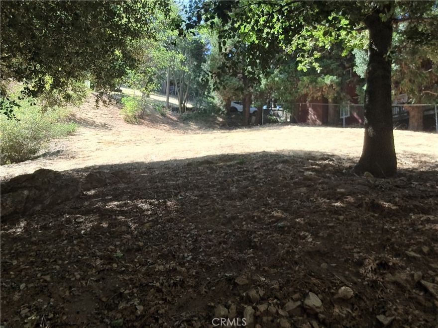 Build Your Dream Home Near Lake Gregory! This spacious nearly 1/3-acre parcel (approx. 12,770 sq. ft.) offers a great opportunity to build your own custom mountain retreat in a peaceful neighborhood surrounded by beautiful homes. Located less than a mile from Lake Gregory, enjoy nearby hiking trails, boating, fishing, along with shopping, dining, and entertainment close by. A rare chance to create your ideal home in one of the most desirable Lake Gregory areas.