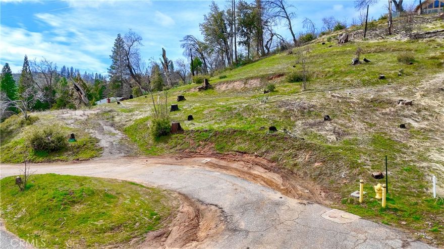 Located in the beautiful Cascadel Woods subdivision, this acre of privacy is at the end of a cul de sac where you can see and hear the rustle of Whiskey Creek. Much of the property has already been cleared, there is an existing driveway, a pad for a home which can easily be expanded, and if that isn’t enough, there is a certified septic system, a power pole on the property and it is on public water. No one will ever build across from you or block your view, as there is forestry land all the way down to the creek. This property is one of a kind. Come take a look – you won’t be disappointed.