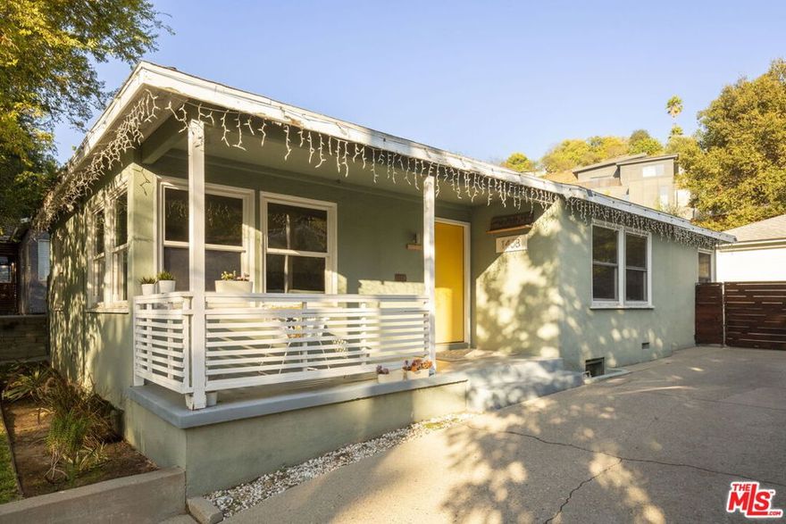 In the heart of Highland Park, lies this charming 3-bedroom, 3-bathroom mid-century home situated on a quiet, tree-lined street, offering an unbeatable blend of tranquility and convenience. Discover your perfect sanctuary in one of Los Angeles's most vibrant and sought-after neighborhoods. Step inside to a bright, open living space immediately showcasing the home's original charm. You'll be treated to abundant natural light streaming through large windows and the warmth of original wood floors. The heart of the home, the kitchen, features a comfortable dining area and ample counter space, perfect for preparing family meals or entertaining guests. A dedicated laundry room with additional storage provides a convenient transition to the backyard. The home offers three spacious bedrooms, including a primary suite with a private en suite bathroom. This property offers unique flexibility and room to grow. The large two-car garage is already partially converted with lighting and drywall, presenting an excellent opportunity for a spacious home office, gym, or potential conversion into an ADU for additional living space, a rental or to keep family close. The backyard is ideal for outdoor living, featuring a spacious area perfect for entertaining and enjoying nice views of the neighborhood. Tucked along a serene street, this home captures the essence of Highland Park, living peaceful yet perfectly connected. Just steps from York Boulevard, you'll find yourself surrounded by local favorites like Sogo, Hermosillo, Joy, and Sip Snack, with markets and everyday essentials close at hand. Inside, enjoy a quiet, private retreat that feels worlds away from the city's hum, yet everything you love about Highland Park's vibrant restaurants, cafes, and boutiques is only a short stroll away. A rare blend of calm and convenience, this home defines modern neighborhood living.
