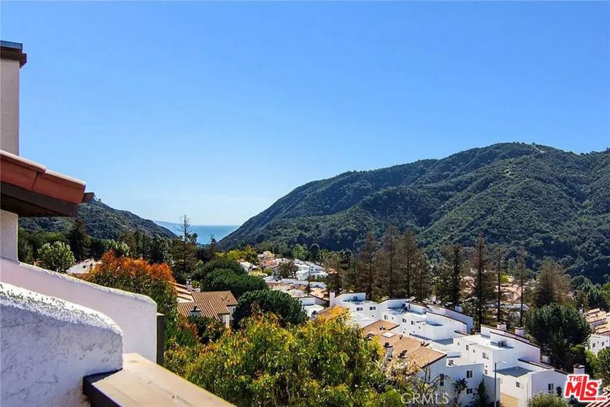 Welcome to the ultimate townhome experience in this exceptional 3-bedroom plus a bonus room, equipped with 4-bathrooms,. Consisting of 2,435 square ft of living space with private direct access to a 2-car garage in the coveted Michael Lane Villas nestled in the tranquil Palisades Highlands. This is your opportunity to own the crown jewel positioned on the LAST ROW with absolutely no neighbors behind you, offering commanding unobstructed views from your private sanctuary perched majestically at the top of all townhomes. This west-facing gem features expansive windows that bathe the space in golden California light while showcasing stunning, unobstructed mountain vistas, plus breathtaking Pacific Ocean views from the primary suite's private balcony. The accessibility is accommodating and easy for every day living. Guest entertaining is a dream with abundant parking right at your doorstep plus unlimited street parking on the main road with virtually no restrictions. Inside, the entry level offers a versatile living area perfect for an ensuite guest room, private gym, home theater, or game room, while the mid-level showcases a completely remodeled gourmet kitchen with brand-new appliances, custom cabinetry, and expansive countertops flowing seamlessly into an elegant dining area overlooking stunning landscapes and a bright family room with fireplace and balcony. The upper level primary suite sanctuary impresses with soaring cathedral ceilings, romantic fireplace, spacious walk-in closet, and that private balcony with sweeping ocean and mountain views that can never be obstructed. Recent luxury upgrades include fresh designer paint, brand new HVAC system, updated doors throughout, modern bathroom vanities, and energy-efficient LED lighting, while residents enjoy resort-style community amenities including sparkling pool, spa and fully equipped fitness center. (Please note the property is currently undergoing some renovations, 2 bathrooms have been stripped out and are being remodeled).