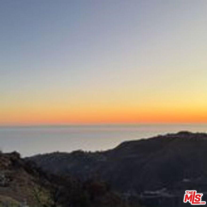THE MALIBU MASTERPIECE YOU CAN ACTUALLY BUILD. THE HIGHEST HURDLES ARE CLEARED. THE PRICE IS IRREPLACEABLE. THE VIEWS ARE FOREVER. This is not a listing; it is the acquisition of a lifetime for the visionary developer or ultra-luxury homeowner. Presenting an EXTREMELY RARE, FULLY ENTITLED 10-ACRE coastal jewel, commanding UNPARALLELED 360-DEGREE PANORAMIC PACIFIC OCEAN VIEWS from the coveted Malibu/Topanga crest. There is genuinely NOTHING else like this on the market. The Permit Nightmare is OVER. Construction is IMMINENT. Forget years of regulatory gridlock. The current owner has done the impossible, eliminating the highest barriers to entry in coastal California. This site is DE-RISKED AND SHOVEL-READY in mere months. ALL ESSENTIAL APPROVALS ARE SECURED: California Coastal Commission (FINAL GREEN LIGHT) LA County Grading Plans, and Fire Engineering Compliance. This is a brand-new, legacy project, not a fire rebuild positioned to capitalize on a market demanding ready-to-go luxury. The property is a natural fortress, permanently buffered on two sides by PROTECTED CONSERVANCY LAND. This guarantees that your breathtaking, unobstructed vistas of the ocean and coastline will remain PRISTINE FOREVER. Accessed by a private road, this is the ultimate canvas for a secluded, masterful estate. Architectural Vision: 7,000 SF of Approved Excellence. The parcel comes with finalized, world-class plans for a 7,000-square-foot luxury compound. Designed by renowned architect Tim Gorter, a specialist in Certified Passive Homes, Fire-Engineered Structures, and LEED design. This is a blueprint for sustainable, exclusive living. Approved plans include: A versatile design (RC10-zoned) grand residence, featuring a spacious courtyard, sparkling pool and spa, three-car garage, and integrated accessory structures. 2195 E Little Las Flores Rd is more than land; it is a secured investment in a timeless California legacy. All entitlement and architectural documents are available upon immediate request. Opportunity knocks, but rarely with permits in hand. Contact the Listing Agent #1 for a private tour.