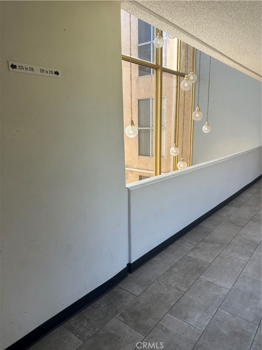 Photo of 5429 Newcastle Avenue #206, Encino, CA 91316 (MLS # SR25128649)