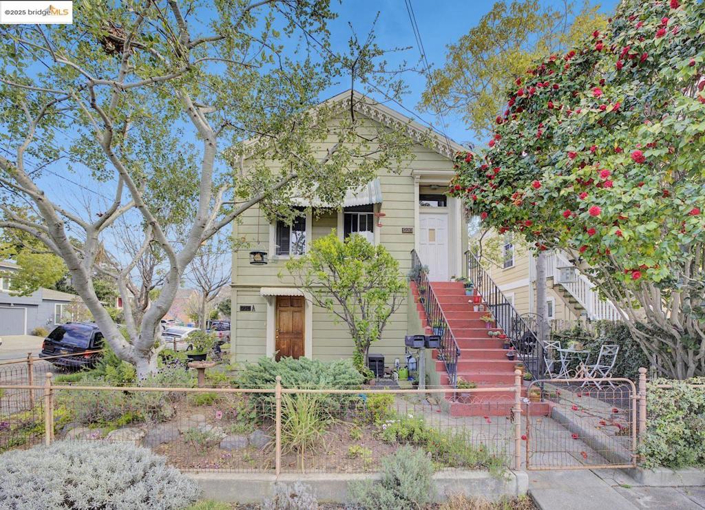 Victorian featuring a duplex and a separate cottage. The upper duplex unit is a spacious 2-bedroom, 1-bath with tall ceilings, hardwood floors with decorative inlays in the living room and bedrooms, an updated kitchen and bathroom with tiled floors, and its own private laundry. The lower duplex unit, also a 2-bedroom, 1-bath at street level, offers the same hardwood floors with inlays, an updated kitchen and bathroom with tiled floors, and private laundry with exterior access. The detached 1-bedroom, 1-bath cottage at 908 Centennial features tall ceilings on the main level, hardwood floors with inlays in the living room and bedroom, and an updated kitchen and bathroom with tiled floors. The lower level includes a private laundry area, water heater, and a 1-car garage. Duplex residents pay for their own electricity; the owner covers gas, water, sewer, and garbage. The cottage resident is responsible for all utilities.