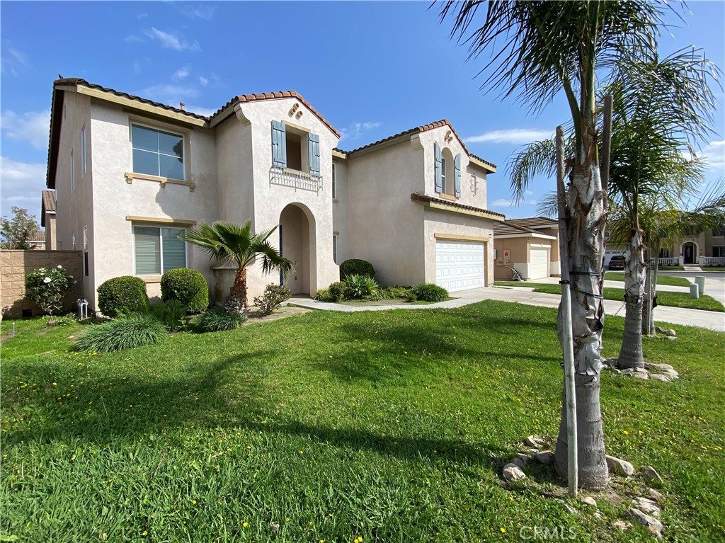 Recently remodeled with new kitchen, new paint and new carpet. This home boasts appeal and is move-in condition. Upon entry, you will find the living room, dining, kitchen with breakfast area and walk in pantry, family and two bedrooms downstairs, one full bath, laundry. The kitchen, which features granite countertops, island, and a breakfast bar. Upstairs you will discover three bedrooms (two which have walk-in closets), full bath with dual sinks, the master bedroom, the master bath includes a separate shower and separate tub, and a large walk-in closet, making this a six-bedroom three bath room home (tax roll five bedrooms). Additionally, this charming home has a attached two-car garage and a spacious backyard. No HOA fees. Close to shopping and walking distance to Eastvale Community Center.