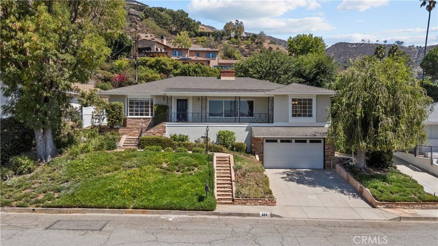 Glendale Home in Brockmont with Guest house! This beautiful 2,853 Square foot home is adorned with 2 fireplaces, vaulted wood ceiling Family room, that leads to your backyard patio, perfect for enjoying your morning coffee! Or maybe sit out on your front porch, while taking in the view of the City lights! The large kitchen has been remodeled, and has its own breakfast nook, and you have a Formal Dining room with city views as well! The Living room also has stunning views with custom ceiling and lighting as well as a decorate Fireplace. The house comes with 3 large bedrooms each with its own bathroom, that all have that midcentury modern vibe. Downstairs leads to the 4th Bedroom and bathroom .  BONUS: 1 Bed 1 Bath 785 SQ FT Guest House. It comes complete with its own bathroom and bedroom area and kitchen and family room with its own fireplace, making it a cozy retreat for your guests!