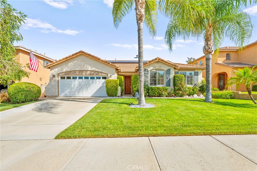 Rare 4 Bedroom Single-Story Home with Panoramic Views in the Prestigious Summerhill Community of Redhawk. This beautifully maintained single-level residence offers the perfect blend of style, function, and location. Nestled on a quiet street in the highly desirable Summerhill neighborhood, this home features 4 bedrooms, 3 bathrooms, and 2,301 sq ft of thoughtfully designed living space on a 6,534 sq ft lot — all with sweeping panoramic views that create a true sense of retreat. From the moment you arrive, the home’s curb appeal makes a lasting impression. Step inside to soaring ceilings, abundant natural light, and an open-concept floor plan that flows seamlessly from room to room. The spacious great room serves as the heart of the home, showcasing a cozy fireplace, oversized windows, and direct access to the backyard — framing the stunning view and filling the space with natural light.
The kitchen is ideal for both everyday living and entertaining, offering granite countertops, a large center island with bar seating, walk-in pantry, and a casual dining area that opens to the living space. Enjoy the sliding glass doors that lead to a professionally landscaped backyard featuring low-maintenance turf, tiled patio, and a retractable awning — an ideal space to enjoy Southern California’s indoor-outdoor lifestyle. The primary suite includes private backyard access and a generous en suite bathroom complete with dual sinks, a soaking tub, separate shower, and walk-in closet space. Enjoy 3 additional spacious bedrooms- perfect for the whole family. Additional highlights include a formal dining room, interior laundry room, and a two-car attached garage with direct access. Located in the award-winning Great Oak High School district and close to Temecula’s renowned wineries, Pechanga Resort, parks, trails, and top-tier shopping and dining.Low HOA and low tax area.This is a rare opportunity to own a view home in one of South Temecula’s most sought-after communities — schedule your private tour today.