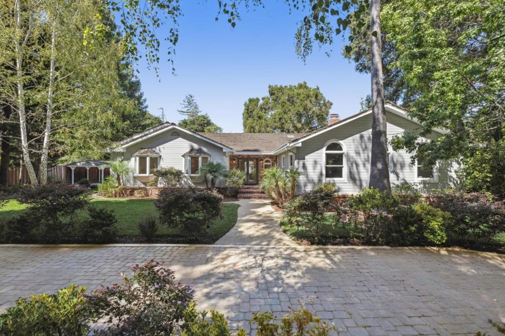 Rarely does a Menlo Park property offer the possibility of a family compound combined with a whole-home renovation. Tucked-away on more than one-half acre gem in sought-after Menlo Oaks, the property features two electronic gated entrances, one leading to the main home and one to the carriage house apartment and guest house. Extensive renovations include new paint, flooring, lighting, bathrooms, and appliances. The one-level main home has 4 bedrooms and 3 baths, while the accessory structures present opportunities for extended family, rental income, and/or remote office needs. Inside, vaulted ceilings, wood floors, and recessed lighting create a bright and stylish ambiance. The public rooms offer versatile living and dining options, and the kitchen has all new stainless-steel appliances. Beautifully landscaped grounds tie it all together. This prime location offers easy access to downtown Menlo Park, Palo Alto, and excellent Menlo Park schools.