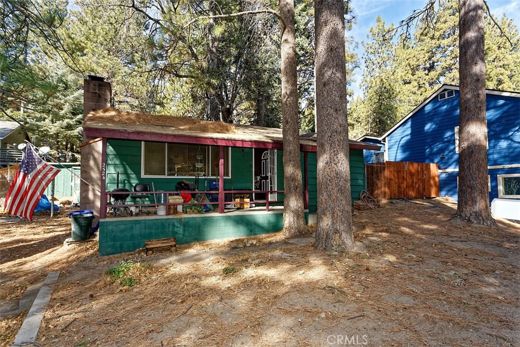 This charming cozy cabin in Running Springs offers the perfect mountain retreat. With 2 bedrooms and 1 bathroom, it’s an ideal space for those looking for comfort and tranquility. The home features a gated backyard with 2 storage sheds, providing extra room for outdoor gear or storage. Relax on the spacious front porch or gather around the fireplace in the open-concept living room for a cozy night in. A convenient laundry room adds to the functionality of this home. Situated within walking distance to the postal office, public library, health clinic, restaurants, and more. You also have Lake Arrowhead within 9 miles, Lake Gregory within 15 miles, and of course Big Bear Lake within 18 miles and can't forget Santa's Village that's within 6 miles from your doorstep. Nearby trails, snow resorts and more. This location is both peaceful and conveniently close to everything you will need.