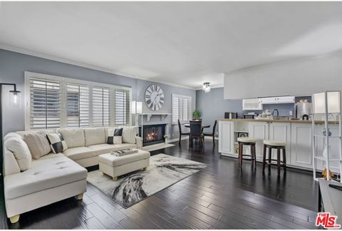 Photo of 11639 Chenault Street #404, Los Angeles, CA 90049 (MLS # 26635761)