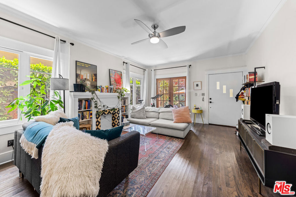 Tucked away in the heart of Echo Park's most coveted enclave, this beautifully updated 2-bedroom, 1-bathroom home effortlessly blends timeless charm with modern sophistication. Spanning an airy 1,250 square feet, the residence is bathed in natural light, accentuating the rich tones of its gorgeous hardwood flooring and highlighting its open, yet intimate layout. Inside, the bright and spacious living spaces flow seamlessly, offering a dedicated dining area perfect for entertaining or quiet mornings with coffee. The stylishly renovated kitchen boasts sleek stainless-steel appliances, contemporary fixtures, and smart design touches that enhance both form and function. Every room is thoughtfully designed to capture the home's inherently sunny disposition, creating a warm and inviting atmosphere throughout. With its refined finishes and enviable location in one of LA's trendiest neighborhoods, this Echo Park gem is a rare find equal parts character and comfort, with modern upgrades that make everyday living effortlessly elegant. Home includes two covered parking spots and a private garden.