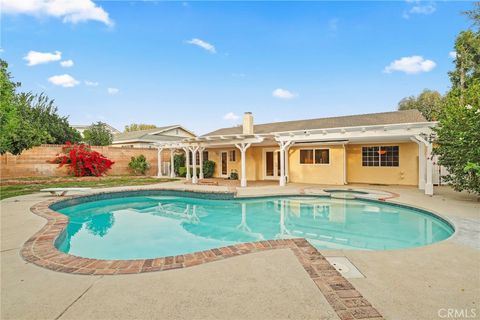 Photo of 11001 Limerick Avenue, Chatsworth, CA 91311 (MLS # SR26043678)