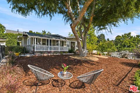Photo of 1443 N Avenue 49, Los Angeles, CA 90042 (MLS # 26869091)