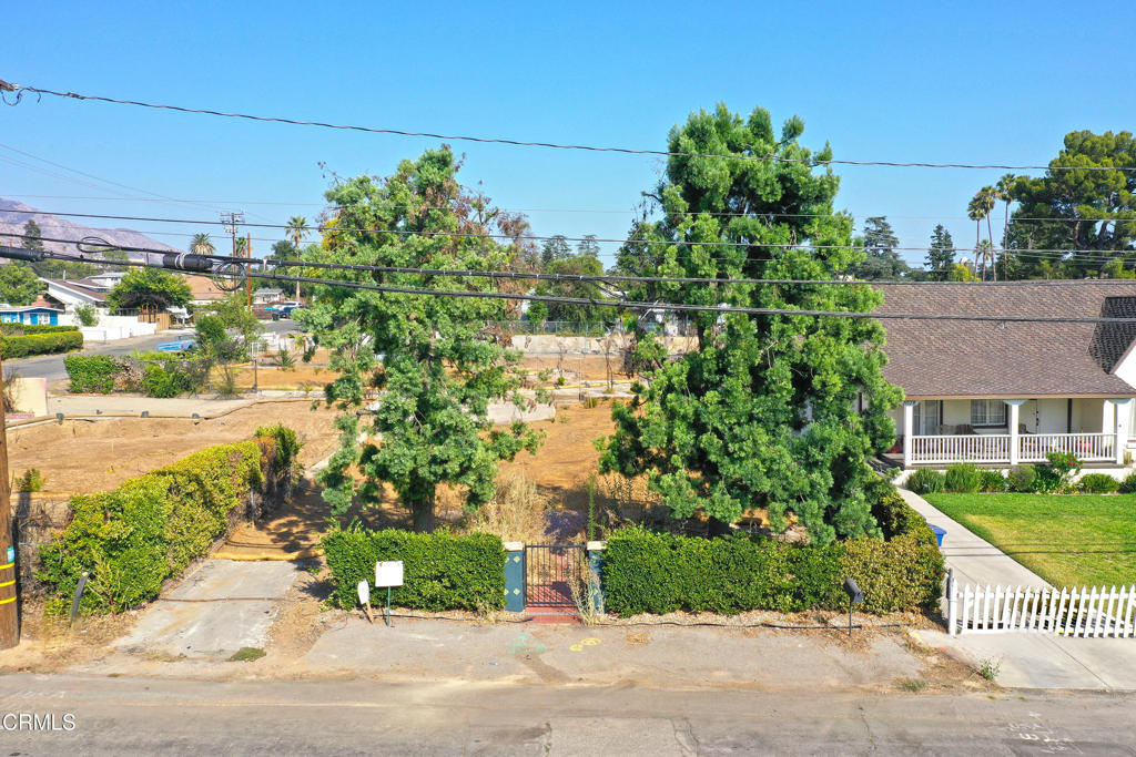 This flat 4,899 square foot lot presents a rare opportunity to build an investment property or dream home with the stunning San Gabriel Mountains as your backdrop. Included are preliminary architectural plans for a 1,600 square foot duplex and a 400 square foot ADU. Phase 2 debris removal has already been completed by the U.S. Army Corps of Engineers. Whether you choose to recreate the previous income property or design a custom residence from the ground up, this lot is a true blank canvas. Picture a sleek modern retreat, a charming Spanish Revival, or a spacious ranch style home. The possibilities are endless. The setting offers both privacy and convenience, just minutes from scenic hiking trails, local shops, and Pasadena's renowned cultural attractions. Opportunities where natural beauty, prime location, and creative potential meet are rare. The property is sold as is.