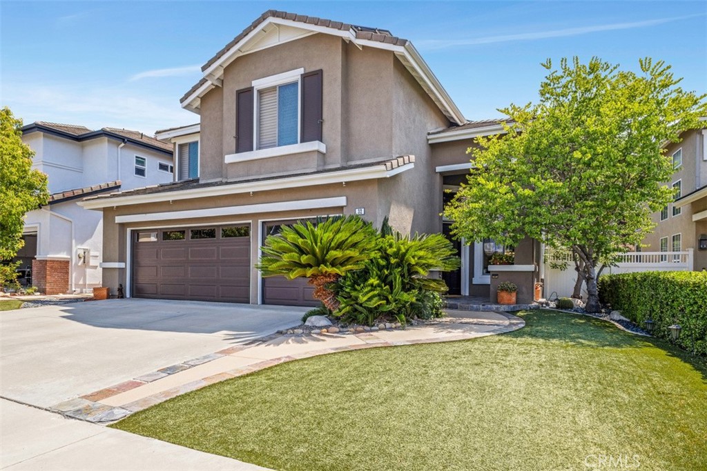 PRICE ADJUSTMENT! – First Time on the Market! Original Owner in the desirable Vista Pointe community of Aliso Viejo. This beautifully maintained home welcomes you with charming curb appeal, featuring drought-friendly turf, mature trees, and an inviting double-door entrance. Inside, timeless hardwood floors span the main living areas, accented by fresh paint, new carpet, and wide baseboards that add a refined touch. Natural light fills the home through Andersen windows trimmed with custom wood sills, as well as high decorative leaded glass windows that create a bright and airy atmosphere. The updated French Country kitchen offers a perfect view of the beautifully landscaped backyard, making it an ideal space for both everyday living and entertaining. A built-in surround sound system enhances the experience throughout the home. Upstairs, the spacious primary suite boasts high ceilings and a generous en-suite bathroom. The second level also includes a comfortable guest bedroom, a functional office with built-in shelving, an open retreat space (4th Bedroom option), and a full guest bathroom with dual sinks. This home offers a number of thoughtful upgrades, including two leased solar systems, a Tesla battery, remodeled showers, epoxy-lined pipes, a leak detection system, a tankless water heater, a newer HVAC system, vinyl fencing, and updated windows. It’s a rare opportunity to own a home that blends classic warmth with modern improvements, offered for the first time by its original owner. Close to award-winning Don Juan Avila Elementary and Middle schools, near Aliso Viejo Town Center and Aliso's 21 parks, and just up the street from Aliso and Wood Canyons Wilderness Park. Several popular hiking and biking trails including the Aliso Creek Trail, Wood Canyon Trail, Rock-It Trail, Mathis Canyon Trail, West Ridge Trail, Dripping Cave Trail, and the Coyote Run Trail.