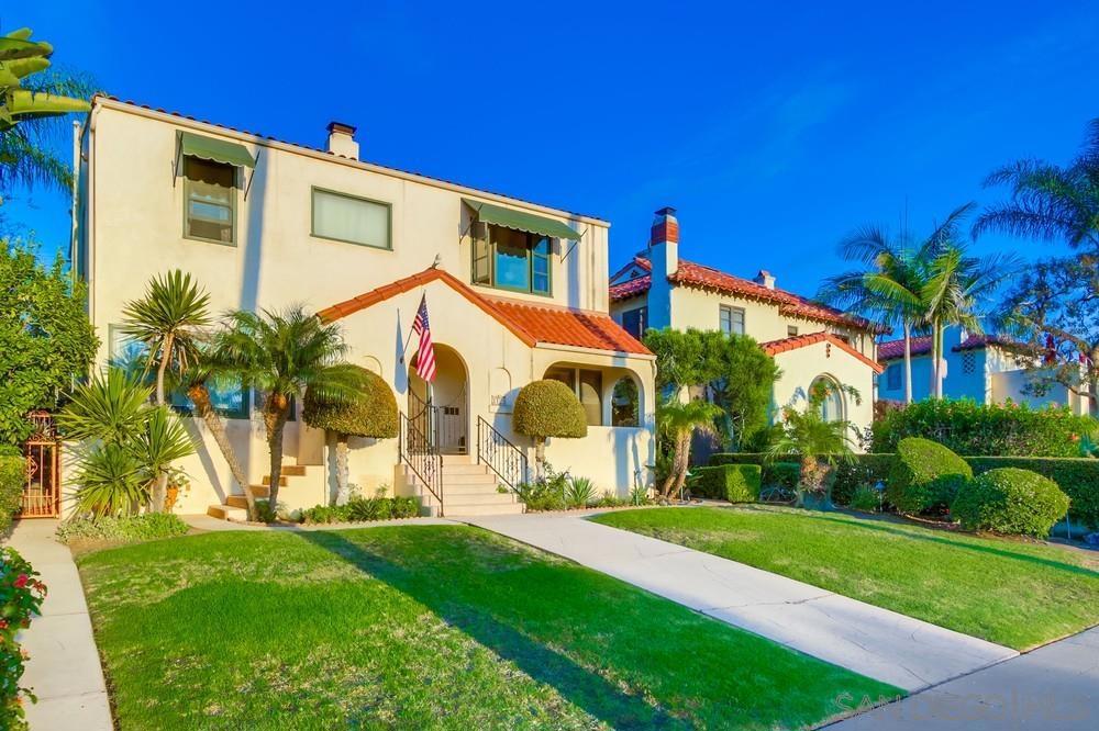 A North Park 2-Story Spanish-Style Beauty Situated On The Most Prestigious North Park Street. This 28th Street Home Is Located Along A 4 Block Stretch Across From Balboa Park And The Golf Course. Stunning city views & evening lights! Front porch allows you to enjoy spectacular fireworks on the 4th of July and some Padres events. Current owners have enjoyed this home immensely for the past 25 years, but now ready for a new family to enjoy and create many more new memories of their own. Home features 4 bedrooms, 2 1/2 baths, original hardwood oak flooring throughout, all newer gum-wood windows crafted from scratch replicating each original window throughout, beautiful front door with a full sheet of copper on the outside, Bacthelder tiled fireplace with heatilator, interior & exterior wood french doors. Custom chef's kitchen with beautiful cabinetry, custom wallpaper in the rear family room and custom bathroom tiling. Fully owned solar system with EV charging station. Rear yard nicely landscaped with a patio, stamped colored concrete and a wide variety of trees, sizable lawn for your kiddos and/or your dogs. Alley access with lots of potential for parking options to be incorporated as one wishes. Steps to kids playground, summer concerts at the Bird Park and a large park for picnics to enjoy the skyline views. Few blocks to restaurant row, shops & more... Video available on the website 3123-28th.com.