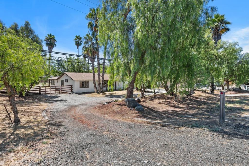 Welcome home to a remodeled Ramona classic! This 3 bedroom and 2 bathroom ranch home located on pretty close to an acre of flat land close to town. Country feel with contemporary updating. Generous living room with cozy wood burning stove, beautiful kitchen with new stainless steel appliances and quartz counters. Master suite includes a private retreat area and spacious walk-in closet. Home shows very well and is a great move-in ready opportunity.