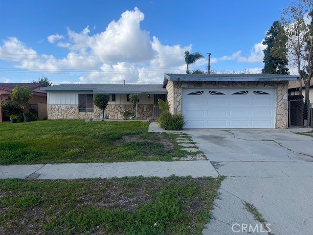 WOW~WOW~WOW!!! Here’s your opportunity to own an affordable home in the desirable Rowland Heights area! Built in 1960, this three-bedroom, two-bath property blends the charm of traditional style with hints of semi–mid-century modern flair. With 1,120 sqft of living space, a two-car attached garage with direct access and a garage door opener for convenience, this home is packed with potential and ready for you to make it your own. Step inside and you’ll find a comfortable floor plan with a full bathroom featuring a tub/shower combo, plus a second bathroom with a stall shower for added convenience off the main bedroom. The living areas offer great natural light and a welcoming feel, perfect for relaxing or hosting friends and family. The central air conditioning and heat keep you comfortable year-round. One of my favorite features is the enclosed patio—not part of the square footage—yet an incredible bonus space. I can easily envision coming home after a long day at work, grabbing a refreshing drink, and unwinding in this private retreat. It’s the perfect spot to read, catch up with loved ones, or simply enjoy a quiet moment. The backyard offers room for you to create your own outdoor oasis—whether that’s adding a garden, creating a barbecue area, or designing a play space. The home does need some updating, which means you have the perfect opportunity to infuse it with your own style and preferences. Picture fresh colors, modern touches, and your personal design flair bringing every corner to life. Close to parks, shopping, dining, and commuter routes, this home offers lots of opportunities. Don’t miss your chance - set a time to see (and make an offer on) this one today! Some pictures were digitally modified.