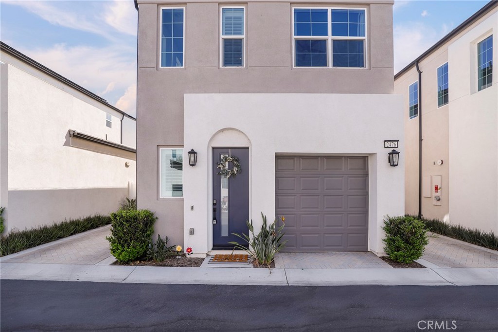 PAID OFF SOLAR, Energy-Efficient two-story detached home nestled in the vibrant and highly sought-after Nuvo Parkside gated enclave—where luxury living meets community charm! This modern contemporary gem is the epitome of style, comfort, and functionality. Bathed in natural light, the open-concept layout showcases refined interiors and a chef-caliber kitchen with quartz countertops, sleek tile backsplash, clean & fresh cabinetry, recessed lighting throughout, and an oversized pantry space—ideal for both entertaining & everyday living, perfect for culinary enthusiasts & entertainers alike. Located just off the kitchen, you have direct access to the fully vinyl fenced concrete slab backyard patio—perfect for outdoor lounging or al fresco dining. Home features a guest powder room downstairs and 2 generously sized & inviting bedrooms with 2 additional bathrooms upstairs. Primary suite includes its own private/spa-like en-suite bath: dual quartz vanities and a frameless glass-enclosed shower. Upstairs also features a versatile loft area ideal for a home office, study nook, or creative studio, along with a convenient laundry closet equipped with Samsung washer and dryer. Home includes an attached one-car garage with an additional private parking space, complemented by ample guest parking available throughout the community. Resort-style amenities designed for families & working professionals include: an olympic sized swimming pool with heated spa, a fully equipped modern fitness center, a fun-filled children’s playground, a dog park for your furry companions, a stylish clubhouse, a multipurpose room and an outdoor BBQ area perfect for big gatherings. while all being conveniently close to Costco/99 Ranch, Victoria Gardens, The Shoppes at Chino Hills and the major freeways: 1-10, 1-15, & Ontario International Airport. With the Ontario Regional Sports Complex opening in 2026 and Ontario Ranch Grand Park Phase 1 opening in 2027, this area is set for exciting growth and vibrant community life. Now is the perfect time to make this home yours!