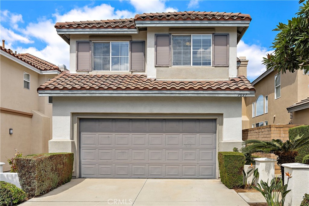 Welcome to 1037 Davis Way, an exquisite 3-bedroom, 3-bathroom home featuring a versatile bonus room, located next to the prestigious Alta Vista Golf Course within the highly sought-after Bella Vista on the Green gated community. One of the rare gems in Bella Vista, this home boasts a charming front yard adorned with rose bushes, adding to its charm and curb appeal, and captivating golf course views of the Alta Vista Golf Course. Upon entry, this beautiful home features an open-concept floor plan adorned by cathedral ceilings and oversized windows in the living room, filling the area with natural light. Downstairs, the living room and dining area seamlessly connect, perfect for entertaining. The bright kitchen and cozy family room adorned with a fireplace open up to the picturesque patio overlooking the lush golf course, perfect for BBQ, outdoor dining, and family gatherings. Experience ultimate convenience with a thoughtfully designed downstairs bathroom, attached 2-car garage, and standard driveway that ensures ample parking for you and your guests. The upstairs features a spacious Primary Suite, two generously-sized bedrooms (one includes a walk-in closet), bonus room (offers plenty of space as an additional bedroom, home office, playroom, or gym), and hallway bathroom featuring bathtub with shower. Experience luxury in the beautifully designed Primary Suite, a perfect sanctuary for relaxation and comfort, featuring patio door access to a private balcony with breathtaking views of the golf course, and a spacious closet. Enjoy mesmerizing sunrises/sunsets from your private bedroom balcony while soaking in the serene landscape. The Primary Suite bathroom is a true retreat, boasting dual sinks, spacious walk-in closet, large bathtub overlooking the golf course, separate shower, and private toilet. Other amenities include recessed lighting and tile flooring. Located approximately one mile from Placentia Library, City Hall, and Police Station, this property offers convenient access to the 57, 55, and 91 freeways (including Cal State Fullerton), and is located in the Placentia-Yorba Linda School District. The low HOA monthly dues cover community amenities including gated access, front yard wall and road maintenance, sparkling pool/spa, and RV parking in accordance with the HOA. No Mello Roos. Don’t miss your opportunity to experience this exceptional property and the unparalleled lifestyle that comes with living in this exclusive neighborhood.