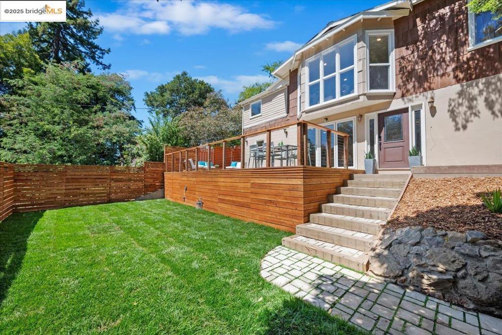 This gorgeous home in the sought-after Glen Highlands neighborhood minutes from the Montclair Village is a beautifully remodeled retreat where modern style meets traditional design and natural serenity. This thoughtfully updated home features clean lines, sophisticated finishes, smart home features, a bonus studio, and a bright, open layout. You'll find airy, sunlit spaces with contemporary design elements throughout. The reimagined kitchen anchors the main living area with sleek cabinetry, quartz countertops, and stainless appliances, flowing effortlessly into inviting dining and lounge spaces, connected directly to a vast outdoor patio space with a large lower front yard. Beautiful flooring, curated lighting bring warmth and polish, creating a calm and cohesive atmosphere. Step outside and discover a rare gem in the hills: a generous, level yard surrounded by trees and sky. Perfect for entertaining, gardening, or simply unwinding, this unique outdoor expanse offers endless potential and a peaceful backdrop for daily life. Set in the hills minutes from hwy 13 and anywhere you would want to go including, parks, restaurants and top-rated schools, this home delivers the best of modern living with a strong connection to nature. It's a place to relax, recharge, and feel at home.