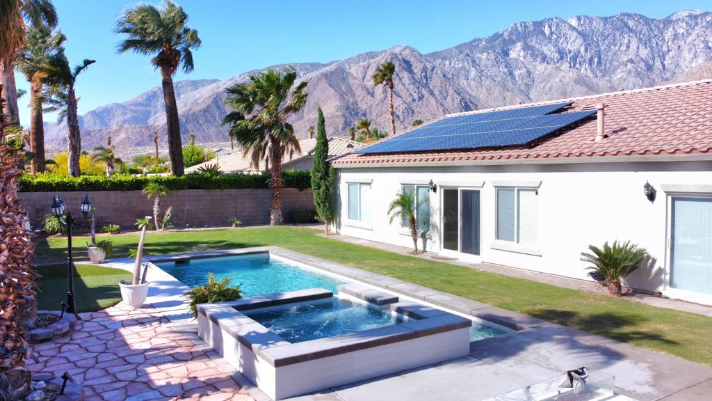 Our most popular floor plan... the Bella has 4 bedroom, 3 baths, including private casita,, perfect for guests, mother in law, or older child! 3 Car garage plus RV parking. Solar panels greatly reduces your cost of power. This one is light and bright with newly painted walls and kitchen cabinets. Backyard has pool with raised spa, conversational fire pit and grassy areas. Great room has cozy fireplace and large area for entertaining, ceiling fan, and stainless appliances in kitchen. Community offers amenities such as tennis courts, basketball court, BBQ area, playground, walking trails and roving security. Located just off Palm Canyon with access to restaurants, shopping, entertainment, and the Palm Springs Tram.