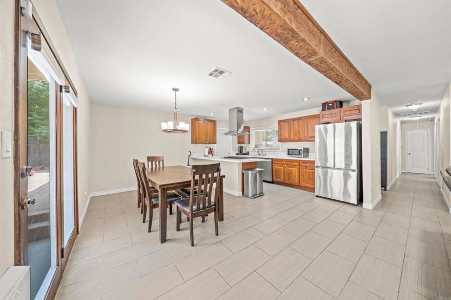 Welcome home to 1434 San Altos Place, a beautifully updated single-story gem in the heart of Lemon Grove. This charming 3-bedroom, 2-bath home spans approximately 1,282 sq ft and is designed for comfortable, modern living. The interior has been thoughtfully refreshed with stylish updates, creating a warm and welcoming atmosphere throughout. The open-concept layout connects the living, dining, and kitchen areas seamlessly, making it perfect for both everyday living and entertaining guests. Enjoy the benefits of paid-off solar panels, providing eco-friendly and energy-efficient savings. Step outside to a spacious backyard ideal for relaxing, gardening, or hosting weekend gatherings. An attached 2-car garage and ample parking add convenience, while the home’s central location offers easy access to local shops, dining, and transit. Nestled in a quiet, well-established neighborhood, this home perfectly blends comfort, functionality, and charm, ready for you to move in and make it your own.