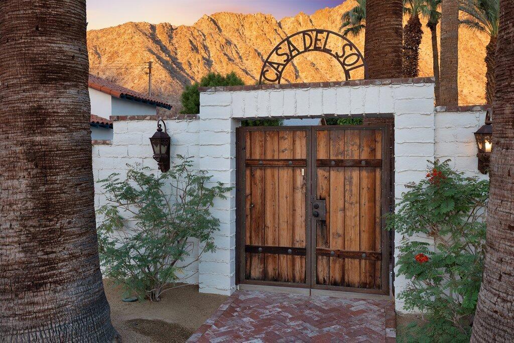 Welcome to Casa Del Sol - a one-of-a-kind 1936 Spanish style retreat that blends historic charm with relaxed desert living. Nestled on a rare triple lot in the scenic La Quinta Cove, this beautifully preserved home offers a true sense of privacy and space, surrounded by desert landscape and picture perfect mountain views. The main home features three bedrooms and two full baths. A separate studio casita includes its own kitchen and bathroom. This property is truly a rare find, Enjoy peaceful mornings in the courtyard, lazy afternoons by the pool with a fun bar area, and evenings exploring Old Town La Quinta's restaurants, shops, and festivals, all just minutes away. Whether you're here for a month-long retreat or a seasonal stay, Casa Del Sol offers the perfect blend of charm, privacy, and the ultimate desert relaxation.---------Available for stays of 30 days or longer. Furnished and ready to enjoy.
