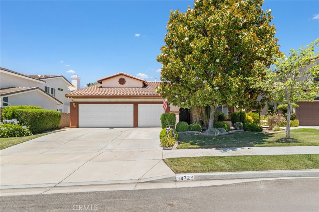 Elegant Single-Story Residence with Bonus Room in Desirable Chapman Heights - Welcome to 34722 Fairport Way, a stunning Contemporary Mediterranean-style home nestled on a peaceful, tree-lined street in the highly sought-after Chapman Heights community. This rare, one-owner, single-level property is on the market for the very first time and offers timeless curb appeal with lush landscaping, a charming front porch, and a tile roof that completes its Southern California elegance. Inside, you'll find a thoughtfully designed open floor plan where the kitchen, dining, and living areas flow effortlessly—ideal for entertaining and everyday comfort. Soaring ceilings, expansive windows, and a cozy fireplace create a bright, inviting space with tranquil views of the beautiful backyard. This home offers 3 spacious bedrooms, 3 bathrooms, and a versatile bonus room, perfect as a home office, gym, playroom, or guest suite. The oversized primary suite is a true retreat, featuring its own sitting area or office space, private backyard access, and a luxurious en-suite bath with soaking tub, walk-in shower, dual vanities, and walk-in closet. Additional highlights include an indoor laundry room, a covered patio for year-round outdoor living, and FULLY PAID SOLAR for energy efficiency. The three-car garage provides ample space for vehicles, storage, or recreational gear. Set in one of Yucaipa’s most desirable neighborhoods, this home combines elegance, function, and location. Enjoy low HOA dues, close proximity to Yucaipa Regional Park, Yucaipa Valley Golf Club, and the seasonal charm of Oak Glen, perfect for apple picking, hiking, and enjoying the outdoors. This is a rare opportunity to own a highly sought-after single-story layout with bonus space, mature landscaping, and incredible pride of ownership in Chapman Heights. Schedule your private showing today and discover the lifestyle waiting for you at Fairport Way. Meanwhile, make sure to check out the VIRTUAL TOUR!