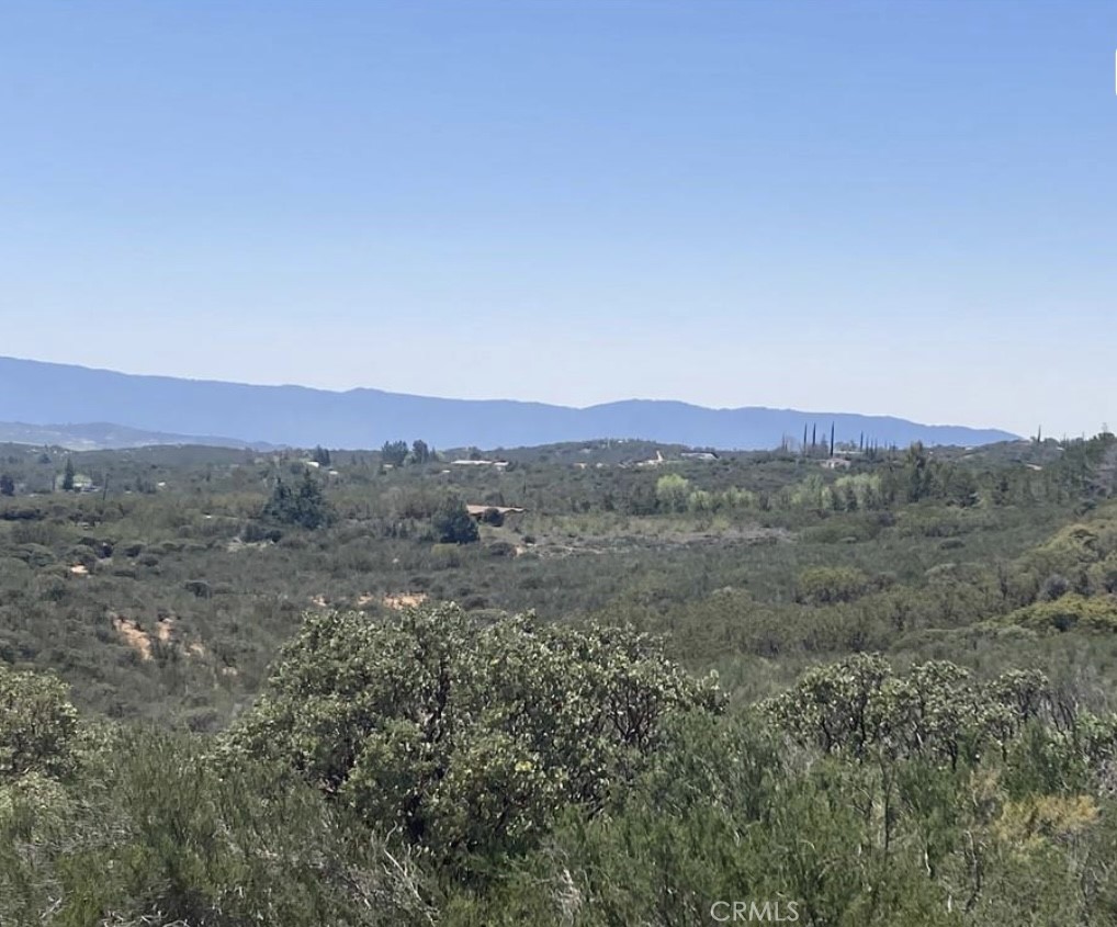(Combined Hemet Lots – Approx. 10 Acres Total) Two adjacent 5-acre parcels in rural Hemet offer a unique opportunity to build, invest, or live off-grid. Both lots feature private water wells, water storage tanks, and open, usable land with scenic hillside views. Electricity is nearby. Zoned R-R (Rural Residential), the land is ideal for custom homes, manufactured housing, agricultural use, or recreational retreat. Access via quiet dirt road off Kafton Rd. Whether you develop one or both, these side-by-side lots are a rare find in Riverside County. Buy one or both—seller is open to separate or combined offers.