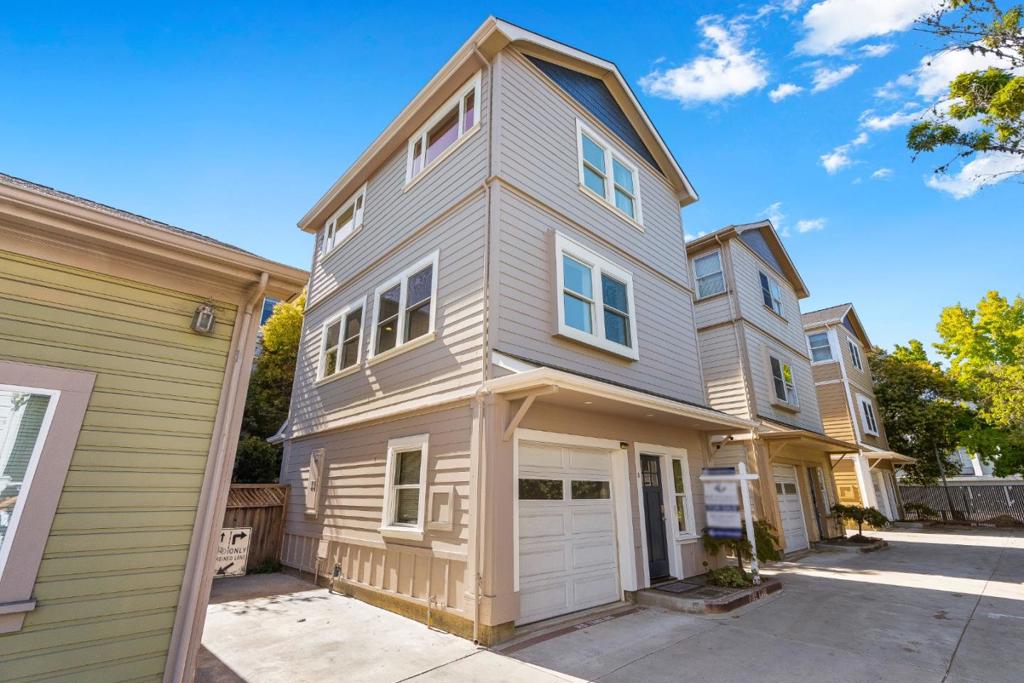 Live in the heart of Santa Cruz where everything is just minutes away! Downtown Santa Cruz, the Wharf, UCSC, the Catalyst, the Boardwalk, and amazing restaurants are right at your fingertips from this modern contemporary home. The first floor offers a bedroom and full bath, plus laundry and a one car garage, ideal for guests, roommates, or extra flex space. The main level is bright and inviting, with the kitchen, dining, and living areas flowing seamlessly together, complete with Brazilian cherry hardwood floors. Upstairs provides two spacious bedrooms and another full bath. From the windows, catch glimpses of the ocean and views of the iconic Santa Cruz Beach Boardwalk. With fresh paint, brand new carpet, and lots of natural light throughout, this 3 bedroom, 2 bath home is move in ready. Whether youre a first time buyer looking for your own place by the beach or an investor searching for a property in one of Santa Cruzs most vibrant locations, this home is full of opportunity and charm.