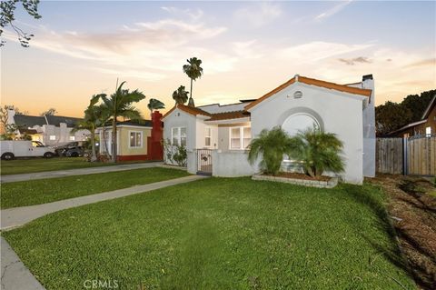 Photo of 718 S Poinsettia Ave, Compton, CA 90221 (MLS # CV26054026)
