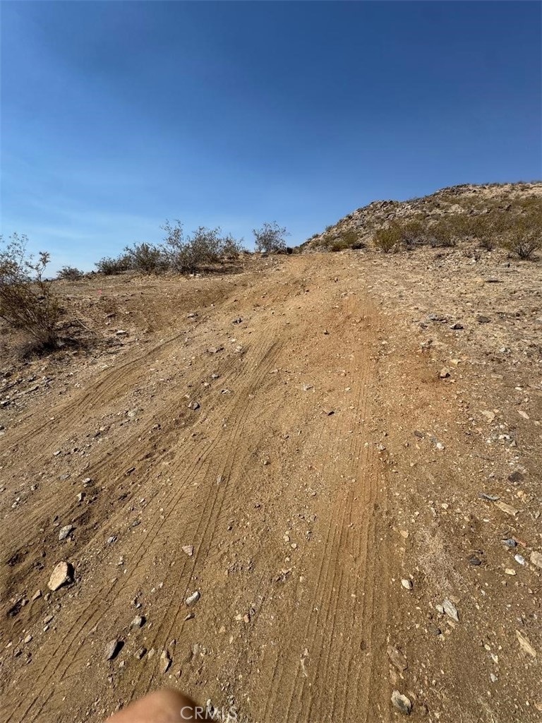 OWN YOUR OWN MOUNTAIN 37.42 ACRES of Land only $195K for all that Land and VIEWS GALORE !!!!!!!!!!!!!!!
Up and coming and growing area of Apple Valley. Surrounded by new homes.
Close to Apple Valley Golf Course and New Shopping area. Very close access to freeways.
Seller is including the plans for a beautiful home with this price, engineering and also includes the water hook up.
Survey work was done and you will see markers coming up the side of the parcel on Plaina Road. There is the starting of the pad for the home.
The views are amazing and you can create your own hiking trails, zip lines, ? use your imagination.
This property can be bought in many ways so this is offer # 1. Offer #2 will also have the underground electrical, septic and permits included for additional pricing. Seller is also willing to build the home and have it move in ready for Offer # 3. Please call with your questions