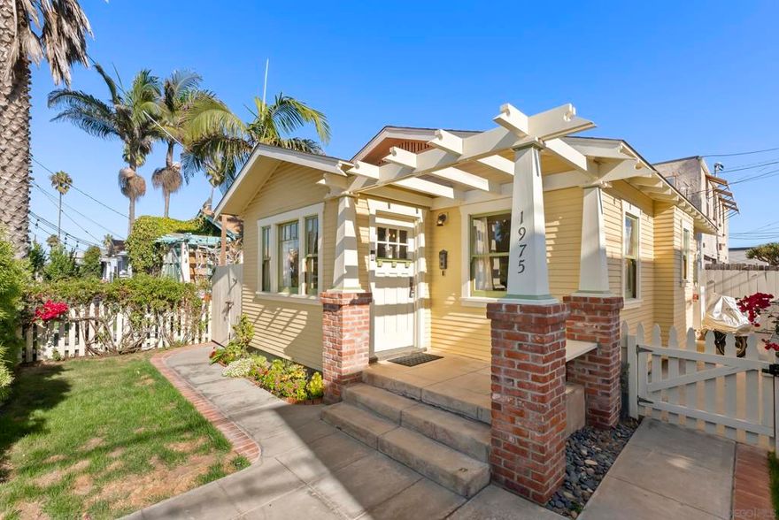 If you’ve been dreaming of a true Ocean Beach classic, this pristine original beach cottage is the one! Bursting with vintage charm and character, this 1922 gem has been lovingly restored from the studs up—combining timeless craftsmanship with thoughtful modern upgrades. Step inside to find lath and plaster walls, gleaming hardwood floors, a cozy brick fireplace, built-ins, and picture rail molding that honor its period roots. The light-filled kitchen features pristine original cabinetry, period tile countertops, charming checkerboard flooring, and a retro stove and oven. A hidden Sub-Zero drawer fridge/freezer and the original “California Cooler” seamlessly blend past and present. The bathroom shines with a restored clawfoot tub, vintage-style flooring, and a classic medicine cabinet. Every detail has been carefully preserved or upgraded, including owned solar, updated electrical panel and wiring, copper and ABS plumbing, seismic retrofitting, and A/C. The exterior retains the home’s original 1922 color, framed by a white picket fence, lush landscaping, and privacy fencing. Enjoy your morning coffee or a relaxing sauna session on the back deck, and take advantage of side-yard parking for two cars + a motorcylce—rare for this coveted location! Just one block from the beach and a short stroll to Ocean Beach’s favorite restaurants, cafes, bars, and shops. This is coastal living at its most authentic—an OB treasure where vintage charm meets modern comfort.
