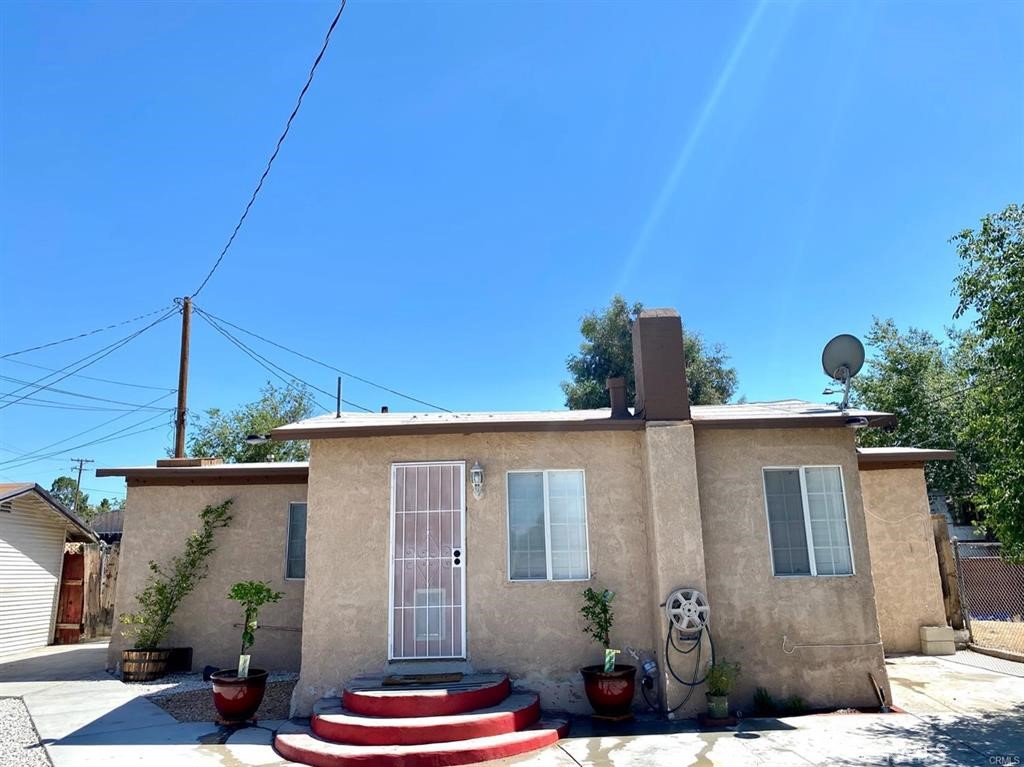 Super cute and cozy 2 bedroom 1 bath home in the City of Barstow. Minutes from the 15 freeway. Plenty of amenities close by like restaurants, shopping and banking. Gated fenced entrance. As you enter your new home you will notice granite countertops and backsplash in the kitchen. Deep dual sinks and new fixtures throughout.Just take a look at the photos. The owner has poured a lot of love into the home. Installed plantation shutters in every window give your new home lots of character. Plenty of light or shade at your fingertips. Beautiful hardwood floors throughout. Strong blowing AC to keep you cool and chill during the warmer months. Separate laundry room for your washing machine and dryer. No need to go to the laundromat anymore. Rock landscaping front and back for minimal upkeep. Beautiful potted plants accents the front. Definitely a one of a kind place. Nice and private.