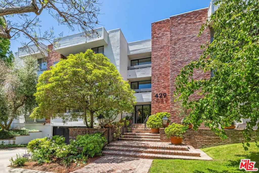 Welcome to this beautiful second-floor condo in Park Oakhurst, an exclusive 15-unit building on Oakhurst, one of Beverly Hills' most desirable tree-lined streets, just north of Beverly Blvd. Steps away from West Hollywood West, Rodeo Drive, the Wallis Annenberg Center for the Performing Arts, the Civic Center, and the most iconic dining and luxury shopping in the country.This spacious residence offers a custom Italian kitchen with granite countertops, frameless cabinetry, and a generous pantryperfect for entertaining. light color floors run diagnally throughout the unit , while large windows fill the home with natural light and tranquil tree views.The oversized primary suite includes a walk-in closet and an en-suite bath. Both bedrooms are well-proportioned with ample storage. Enjoy the convenience of in-unit laundry, central air and heat, and two parking spaces in a secure underground garage with additional storage.The controlled-access building features remote garage entry, updated lobby , shared courtyard, and security cameras on every floor. Low HOA dues include earthquake insurance, hot and cold water. Located just a short stroll from Cedars-Sinai Medical Center, farmers markets, and everyday conveniences, this condo is also within the highly rated Beverly Hills School District and benefits from premium Beverly Hills city services.Don't miss the chance to personalize this home and experience luxury living in the heart of 90210. Park Oakhurst building upgrades include Butterfly Mx intercom, New "cool" roof application (2020). painting of the exterior of the building, remodeling of the common courtyard, new guest parking space, Additon of a dog run and so much more! Balcony inspections have also been completed and passed.