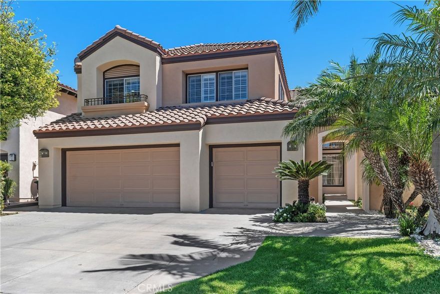 Welcome to this stunning two-story home in the desirable gated community of Tustin Ranch, offering over 2,900 sq. ft. of beautifully upgraded living space. This residence features marble and wood flooring throughout, soaring ceilings, and recessed lighting that enhances its elegant design. The completely remodeled kitchen boasts new cabinets, modern appliances, a large island with bar seating, and a bright breakfast area that flows into the spacious family room with a cozy fireplace. The home offers four bedrooms plus a bonus room and three remodeled bathrooms—one bedroom and bath conveniently located downstairs. Each bathroom is upgraded with modern fixtures including handheld and rain showers. Additional highlights include a formal living room, formal dining room, recessed lighting throught and ceiling fans in all room. A three-car garage with epoxy floors. The backyard is generously sized yet low-maintenance, perfect for relaxing or entertaining. Centrally located near major freeways, this home combines luxury, comfort, and convenience in a secure gated setting. Walking distance to prestigious Tustin Memorial Academy.