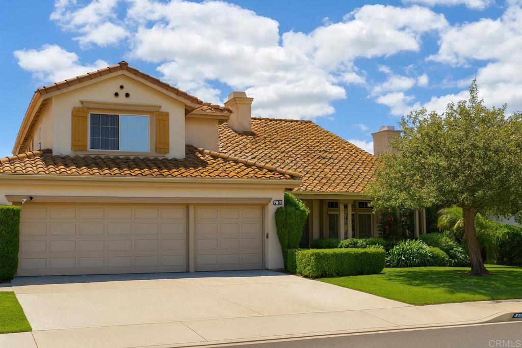 West Murrieta Stunner—4BR + Office + Loft | 3 Baths | Finished 3-Car Garage w/ EV | Light-Filled, Flexible & Move-In Ready Soaring volume ceilings, walls of windows and an airy, open flow set the tone the moment you step into this 2,650± sq ft two-story home. A dramatic living/dining area anchors the entry and opens to the family room with fireplace, creating effortless everyday living and entertaining. Kitchen & main level: An open-concept kitchen sits at the back of the home with garden views, breakfast area and wet bar, and direct access to the patio and fully fenced yard. The first floor also features a private downstairs bedroom and full bath, a separate office/utility room, under-stairs storage, and an interior laundry with pass-through to the garage. Upstairs layout: At the top of the landing, a generous loft connects two well-proportioned bedrooms that share a dual-vanity bath. The primary suite enjoys treetop and mountain-peek views and double-door entry to a retreat with a cozy gas fireplace—ideal as a lounge, nursery, gym or second office. The spa bath offers a soaking tub, separate shower, dual sinks and a walk-in closet. Garage & storage: The attached finished 3-car garage (approx. 589 sq ft of enclosed usable space) includes cabinet storage, a side-yard door and an EV charging outlet—perfect for hobby space or a home workshop. Outdoor living: Mature landscaping frames a private, low-maintenance backyard with room to play, garden and entertain. Location perks: Sought-after West Murrieta setting within an award-winning school district. Minutes to Historic Old Town Murrieta, shopping and dining; close to hiking trails, golf, community parks and quick I-15/I-215 access. Highlights you’ll love Bright, voluminous great room with extensive windows 4 bedrooms including a main-level bedroom + separate office + loft Two fireplaces (family room & primary retreat) Mix of tile and wood/laminate flooring; plantation shutters in select rooms Wet bar and easy indoor-outdoor flow to patio and yard Finished 3-car garage with cabinets, side door & EV charging