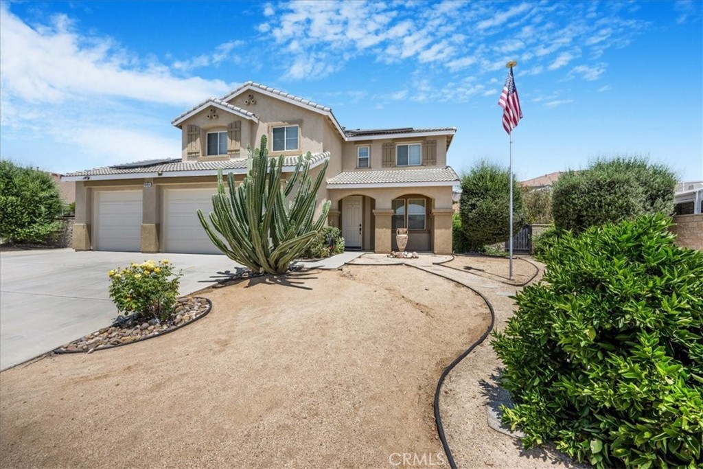 Welcome to your new turn-key and go Home, This spacious and beautifully upgraded 5 Bedroom 3 Bath home offers nearly 3000 sq ft of living space on just under a half acre. Step inside to an inviting open concept layout featuring new carpet in all bedrooms, luxury vinyl waterproof plank flooring, Quartz kitchen countertops,an in counter microwave, a large island, self closing cabinets and drawers and a ready when you are wet bar. Once outside you will be greeted by a variety of fruit trees, Lime, Peach, Orange, Lemon, plum,and Tangelo are just a few of many. This gem of a home has a huge covered patio and built in concrete BBQ complete with refrigerator and bar seating. There is a private jacuzzi with mounted TV and a new cover will be included. Let’s not forget that there are 26 solar panels most are owned just a hanful are not. There is an EV charging station and a Huge detached Man Cave/She Shed on property as well.
The front yard is drought tolerant and very low maintenance. Whether your seeking room to grow or looking to entertain and enjoy the good life this Home is for you.