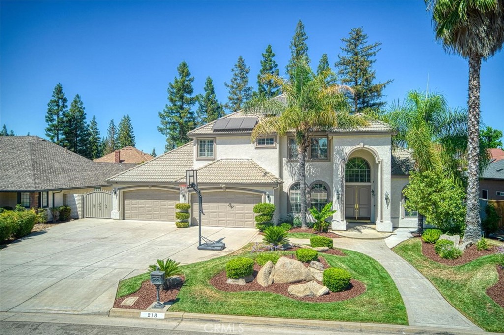 This stunning 5-bed, 4-bath Image Custom Home sits on a quiet cul-de-sac just minutes from River Park and Woodward Park trails. Featuring OWNED SOLAR, a 4-car finished garage, formal dining room, open-concept great room with built-in entertainment center, office, custom archways, and wood flooring, this home blends elegance with function. The chef's kitchen boasts granite counters, prep island with sink, double ovens, walk-in pantry, and new appliances (2025). The first-floor primary suite is a private retreat with French doors, a sitting area with fireplace, spa tub, oversized shower, and a huge walk-in closet with custom built-ins. A separate in-law suite, an upstairs loft, and two additional bedrooms offer versatile living options. A gym addition with its own dedicated HVAC adds even more flexibility. Step outside to your backyard oasis featuring a pebble tech pool, two gazebos, a stunning custom outdoor kitchen, and lush landscaping perfect for entertaining. Additional features include owned solar, plantation shutters, Tesla 220V charger, and fresh interior (2025) and exterior (2024) paint. This home truly has it all!