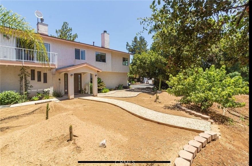 Quiet country home, only 7 minutes from 15 freeway and not far from city.  The home is about 3,300 sq ft, 5 bedrooms 4 baths with huge outdoor deck and beautiful views of mountains, valley and avocado country.  The home sits on a huge 1.7 acres lot! This is perfect for tenants who work in construction and landscaping where you need space to park your vehicles and equipment.  NO commercial vehicles please since the city wont allow them as this is residential zoned only.  The 5th bedroom on the first floor is an attached ADU on the first floor, perfect for your in laws or for your extended family.  This unit has separate entrance, its own kitchen and family room long with a bedroom and bathroom suite.  This ADU is about 700 SQ FT and  would be a perfect fit for multi-generation families. NO PETS preferred, but pet and small, non-aggressive dogs are OK for an additional of $50/per pet/month, outdoor pets only as we have carpets inside the house.  Pet deposit $1000 and one month rent security deposit.