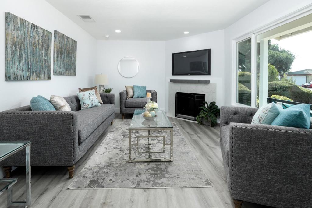 Beautifully updated single level home located on a corner lot in the Brookvale neighborhood of Fremont. The home has a bright and fresh feel with oversized windows and luxury vinyl plank flooring throughout. Upon entering you are greeted with a spacious living room featuring a cozy fireplace. The well-appointed kitchen has been updated with a modern color scheme and features shaker style cabinets, quartz counters, stainless steel appliances and breakfast bar. There is also an adjacent separate dining area with a sliding glass door opening onto the landscaped side patio. The primary suite is a relaxing retreat featuring a walk-in closet, quartz counters, double sinks and stall shower. Other outstanding features include two-car garage, new furnace, new interior doors, recessed lighting and new automatic garage door. Conveniently located within walking distance to schools, just minutes from shopping, restaurants and Quarry Lakes Regional recreation area, major highways and BART station.