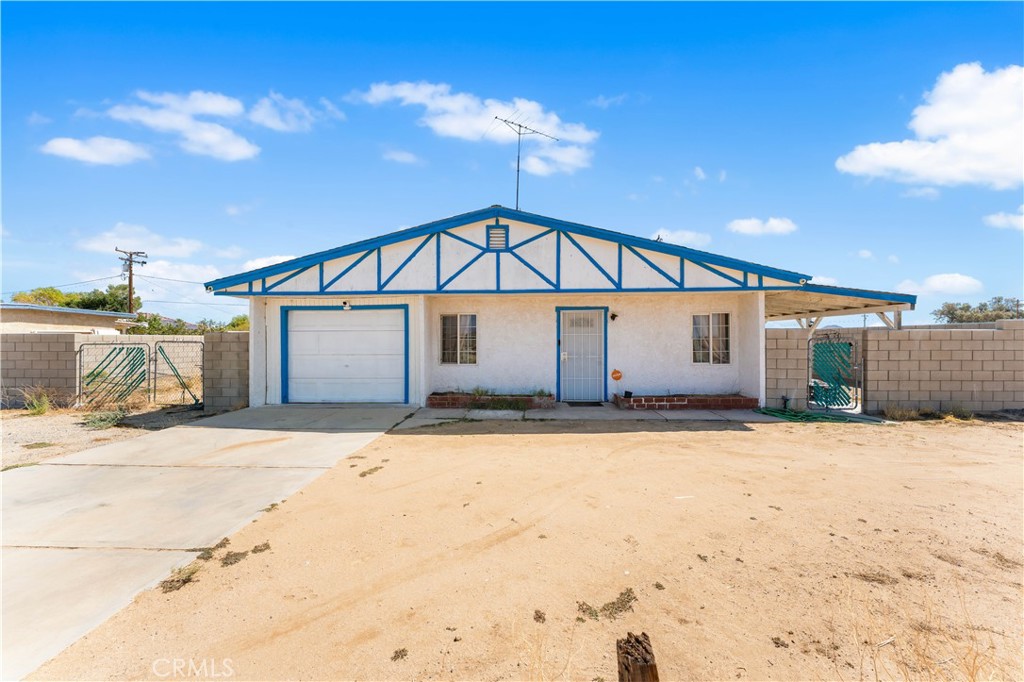 ***Cozy 2 bedroom/1bath home perfect for first time home buyers or someone planning for their retirement!! Located in a quiet neighborhood with a great desert view. Two good sized bedrooms, and 1 bathroom. Newer tile floor throughout. Kitchen/dining combo with ample cabinet space. New electric stove. Brand New Furnace & A/C Unit and ducting and insulation, Newer Roof, Water heater is newer and is also electric, New electric panel, New thermostat. Dryer has hookups for gas & electric. Propane lasts a long time because 95% of the furnace uses electricity. Appliances are all electrical and house has solar so bills really low (Low solar lease payments of $93/month). 1 car garage and property has RV access. Huge backyard Block wall fence all around the property. Built-in outdoor grill. Septic is newer & just pumped. Close to Cal City Blvd, Easy access to the main road and the freeway. Come check this home now before it's gone!!
