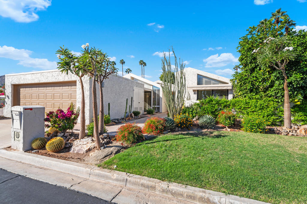Located inside the gates of Ironwood Country Club, this Private Desert Retreat offers the perfect blend of desert elegance and modern comfort. The front yard is beautifully landscaped with majestic Eisenhower Mountain views. Inside, an open-concept great room showcases vaulted ceilings, large windows, and new sliding glass doors leading to a tiled private patio--ideal for relaxing or enjoying the nearby pool. The primary suite is private and features custom cabinetry, double sinks, travertine floors and shower, and large walk-in closets. Both guest bedrooms have en-suites, one with its own patio. The chef's kitchen is a showpiece with custom cabinets, soft-close doors, split-faced travertine backsplash, leathered travertine counters, and Thermador appliances, including a six-burner gas range, double ovens, and a warming drawer. Additional highlights include solar with Tesla backup batteries, electric golf cart with lithium batteries, new awnings front and back, fresh exterior paint, new landscaping and sprinkler system, new Jacuzzi, ceiling fans, and motion and pathway lighting. The two-car garage adds convenience for direct access to the home. Furniture is included in the purchase price.Ironwood Country Club offers two Championship 18-hole courses and one of the most active golf programs in the Coachella Valley for social and competitive play. Other member amenities include Tennis, Pickleball, Pop Tennis, and Bocce Ball Courts, A State-of-the-Art Wellness Center, Dining and Club Social Events & Activities. Membership is by application and requires sponsorship. Membership is not included in this sale. It is not required that homeowners in Ironwood be members of the club. The Club offers a variety of memberships please contact them for more information 760-766-1000