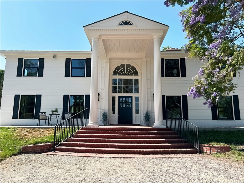 NEW LOWER PRICE! Welcome to a truly exceptional equestrian estate where timeless colonial charm meets modern luxury. Tucked away in the prestigious Orange Park Acres community, this beautifully reimagined 5-bedroom, 5-bathroom home sits on nearly two acres of serene, tree-lined land.
Every inch of this residence has been thoughtfully renovated from the ground up, showcasing custom designer finishes, natural stone accents, and elegant paint selections that create a warm and sophisticated ambiance.
Equestrian enthusiasts will fall in love with the top-tier amenities, including a professional seven-stall barn with a dedicated tack and hay room, a full riding arena, and a round pen—ideal for training, riding, or simply enjoying the lifestyle.
Outdoors, the estate transforms into a private resort. This gorgeous home is set back from the road and the mature trees provide natural shade and privacy, while the sparkling pool, expansive patio, and built-in barbecue area make it perfect for entertaining or relaxing in style. A new iron smart gate offers both convenience and peace of mind.
The detached two-car garage includes an additional space for an office, workout area or studio. The oversized lot allows room for expansion or a future ADU or whatever you may need or desire. Concrete hardscaping seamlessly connects all outdoor spaces, enhancing both beauty and functionality.
Set in one of the most sought-after neighborhoods, this estate offers the perfect blend of tranquility and accessibility. Sophisticated, spacious, and designed with every detail in mind, this is more than a home—it’s a lifestyle.
Video tour on 360!