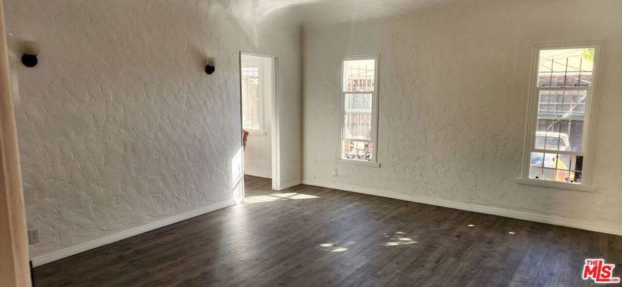 Newly renovated apartment. It has Air conditioning, vinyl flooring, stainless steel appliances, stove, microwave, dishwasher, refrigerator, high ceilings. #2 is the lower unit. No pets. Street parking only. Water & Trash paid. One year lease. Minimum of 700 credit score is required; income has to be 2.5 X times the rent.