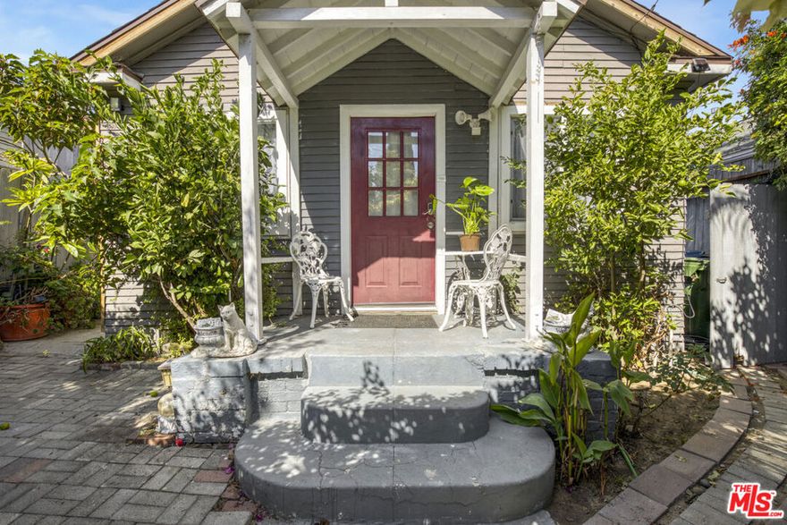 Welcome to your charming Hollywood haven! This cozy 2-bedroom, 1-bath bungalow is nestled in the heart of the Hollywood Hills, just minutes from the iconic Hollywood Bowl and legendary landmarks like the TCL Chinese Theatre, Walk of Fame, Paramount Pictures, and the Dolby Theatre, home of the Oscars. Enjoy modern comforts with newer dual-pane windows, central air and heat, and a vaulted ceiling that brightens the living and dining areas. Step outside to your private courtyard, perfect for relaxing or entertaining under the lush landscaping, including your very own tangerine and lemon tree. With privacy, a front iron gate, and the friendliest price in the Hollywood Hills, this is a rare opportunity.  Ask the city about adding a second story!