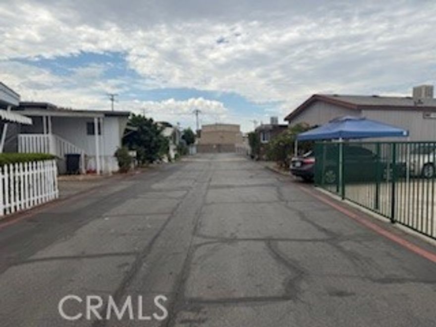 Great opportunity to own your own manufactured home/space in "Baldwin Park" just minutes east from DTLA. Located in the "Walnut Creek" development good ingress/egress access just pull into park make a quick left your home. Property consists of 1 bedroom 1 bath 648 sf with attached tandem carport & covered porch . There is an area that can accommodate meditation area or a dog-run , buyer to verify with park manager and complete their due diligence. Located in front of pool for easy access or if entertaining guests, this one will go fast. Lets Go.......