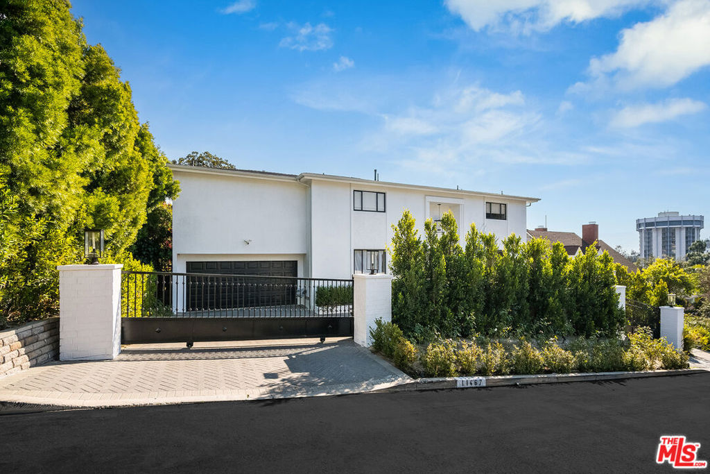 Welcome to 11467 Thurston Circle. This fully remodeled turn-key, meticulously curated home was totally redone with no expense spared and is ready for your arrival. This six bedroom, six full bathroom, 2 story Bel Air home is nestled on an apx. 12,749 sq.ft. lot behind double gates with a circular driveway, 2 car garage and stunning curb appeal. A grand entrance leads you into an open floor plan with high ceilings, oak flooring, wine library, formal library and wet bar, perfect for entertaining. Custom high-end finishes throughout the home, a Flare fireplace and a Miele kitchen with integrated appliances are just a few of the property's special offerings. Multiple sets of French doors open up to the expansive back yard with great spaces to entertain or enjoy time with your family and friends. This inviting back yard provides multiple lounging areas, a fire pit with an outdoor BBQ area surrounded by mature, lush landscaping, green grass and a fabulous swimming pool.