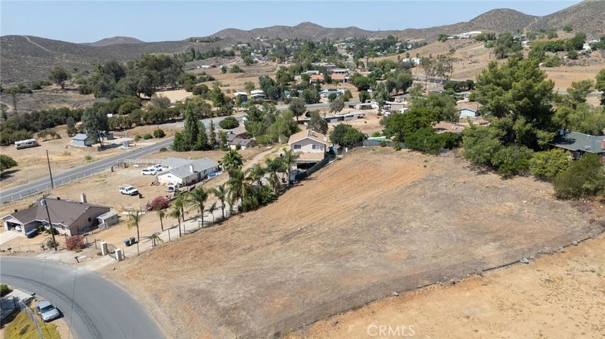 GREAT PIECE OF LAND WITH UTILITIES NEXT-DOOR! *Welcome to 0 Cottontail Drive in Menifee, CA!  This vacant residential view lot is nearly 1/2 an acre boasting 17,424 square feet.  Utilities are next door and you can build on this lot right away as there is no moratorium that affects this specific lot. Call agent for help in installing a manufactured home on a permanent foundation or to discuss this lot as a buy and hold investment.  Buy now for the future as there is a ton of development going on in this area. PRICE DROP. SELLER MOTIVATED.